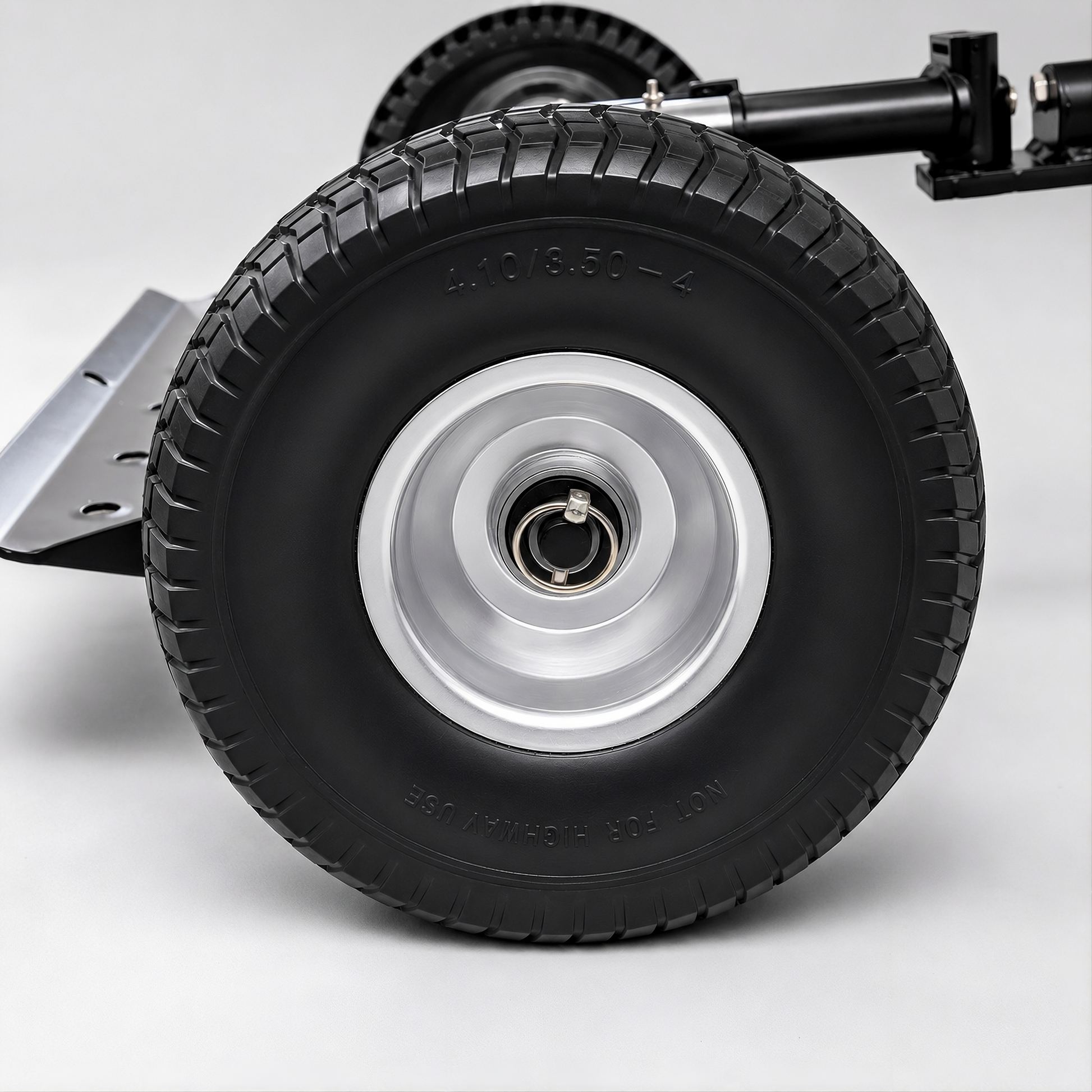 Jungle Wheels 900-FF Flat-Free Replacement Wheel mounted on a Jungle Jim’s Sulky, the puncture-proof, zero-maintenance alternative to the standard 900 pneumatic tire.
