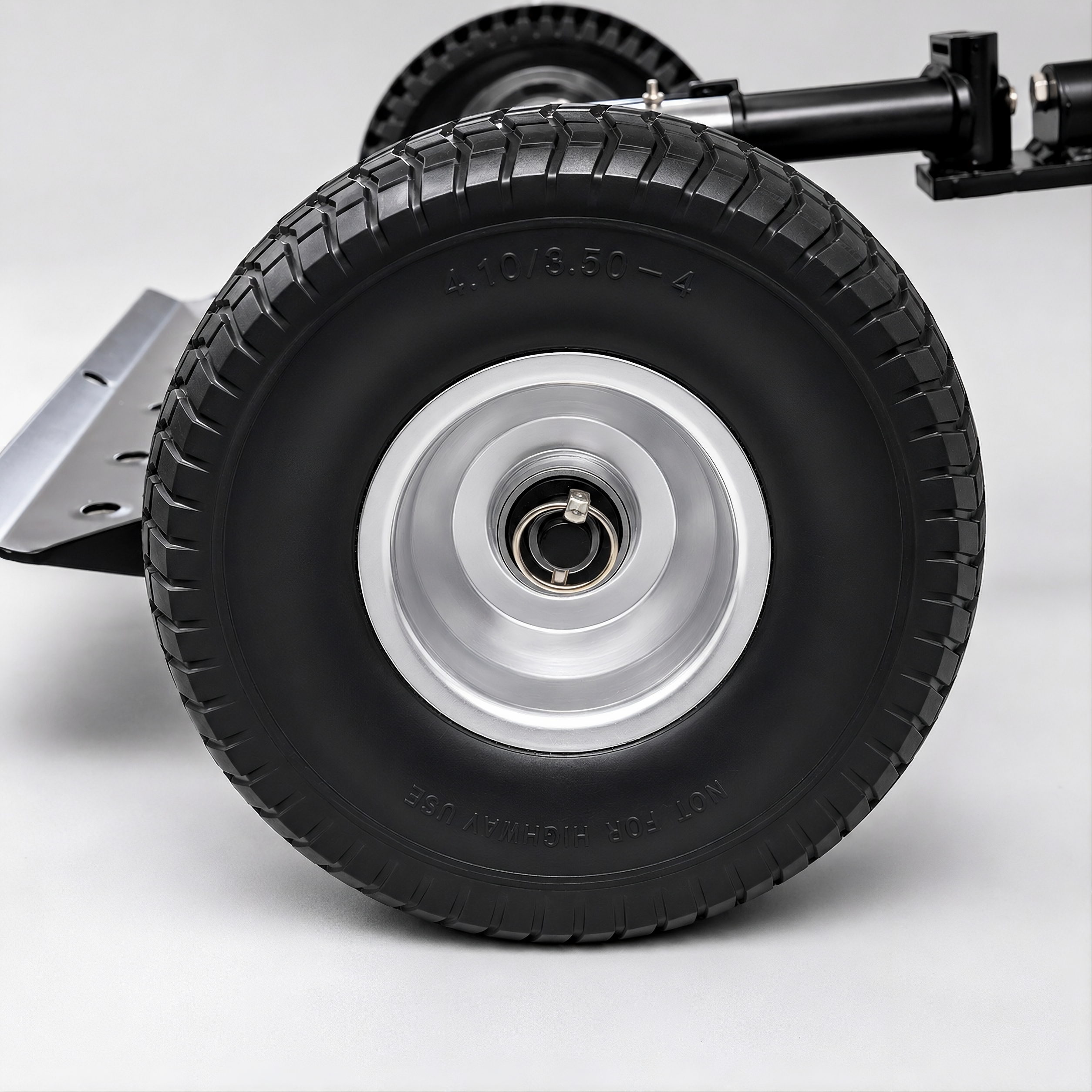 Jungle Wheels 900-FF Flat-Free Replacement Wheel mounted on a Jungle Jim’s Sulky, the puncture-proof, zero-maintenance alternative to the standard 900 pneumatic tire.